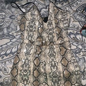 Cute sparkly romper. Gold Black and Tan